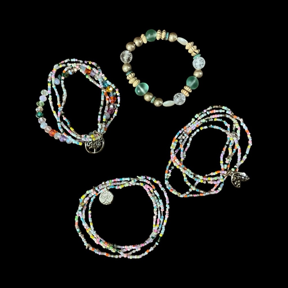 Three Multi Strand Stretch Bead Bracelets and One Single Strand Stretch Bracelet